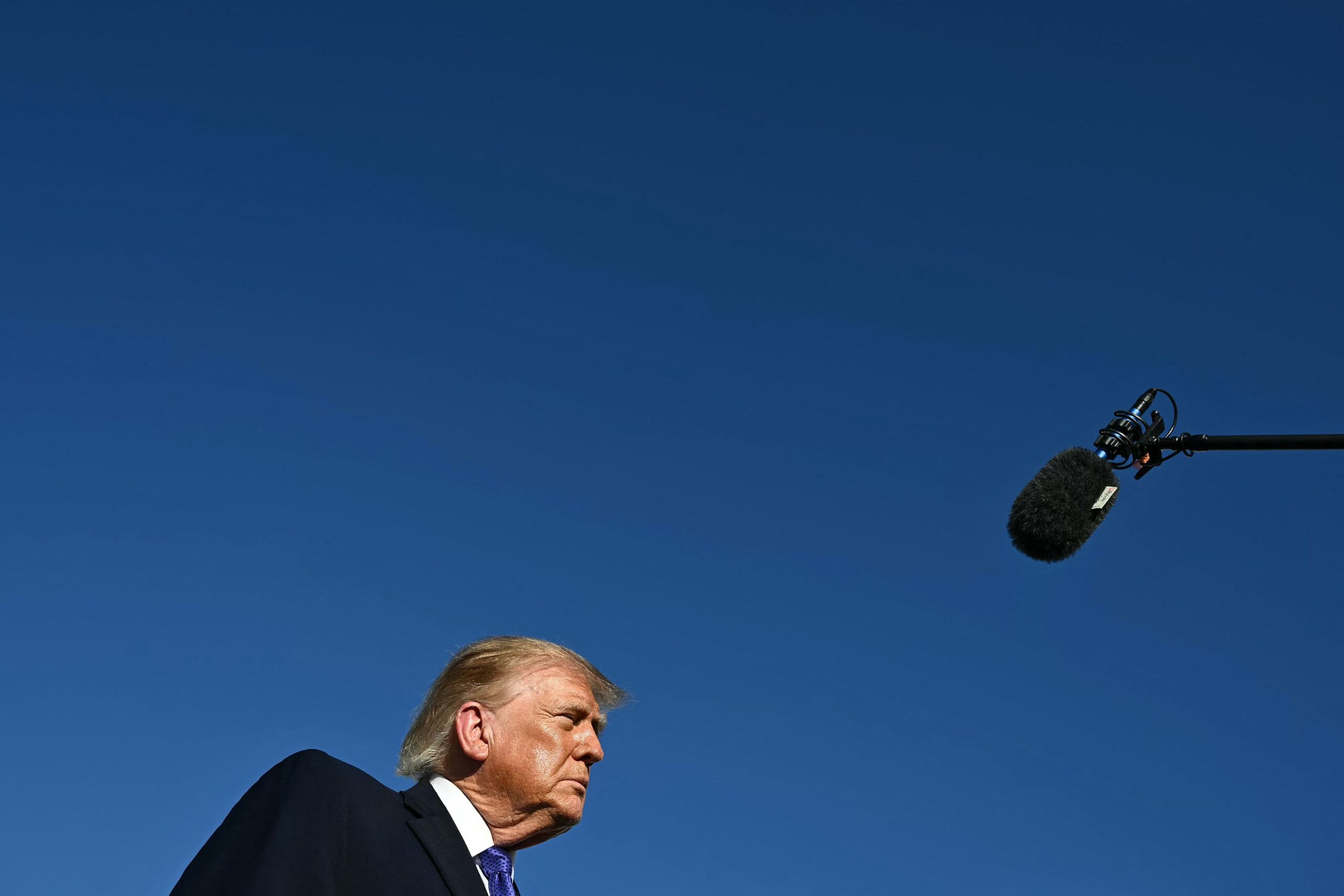 <i>Kent Nishimura/AFP/Getty Images via CNN Newsource</i><br/>President Donald Trump speaks to reporters after exiting Air Force One at Joint Base Andrews