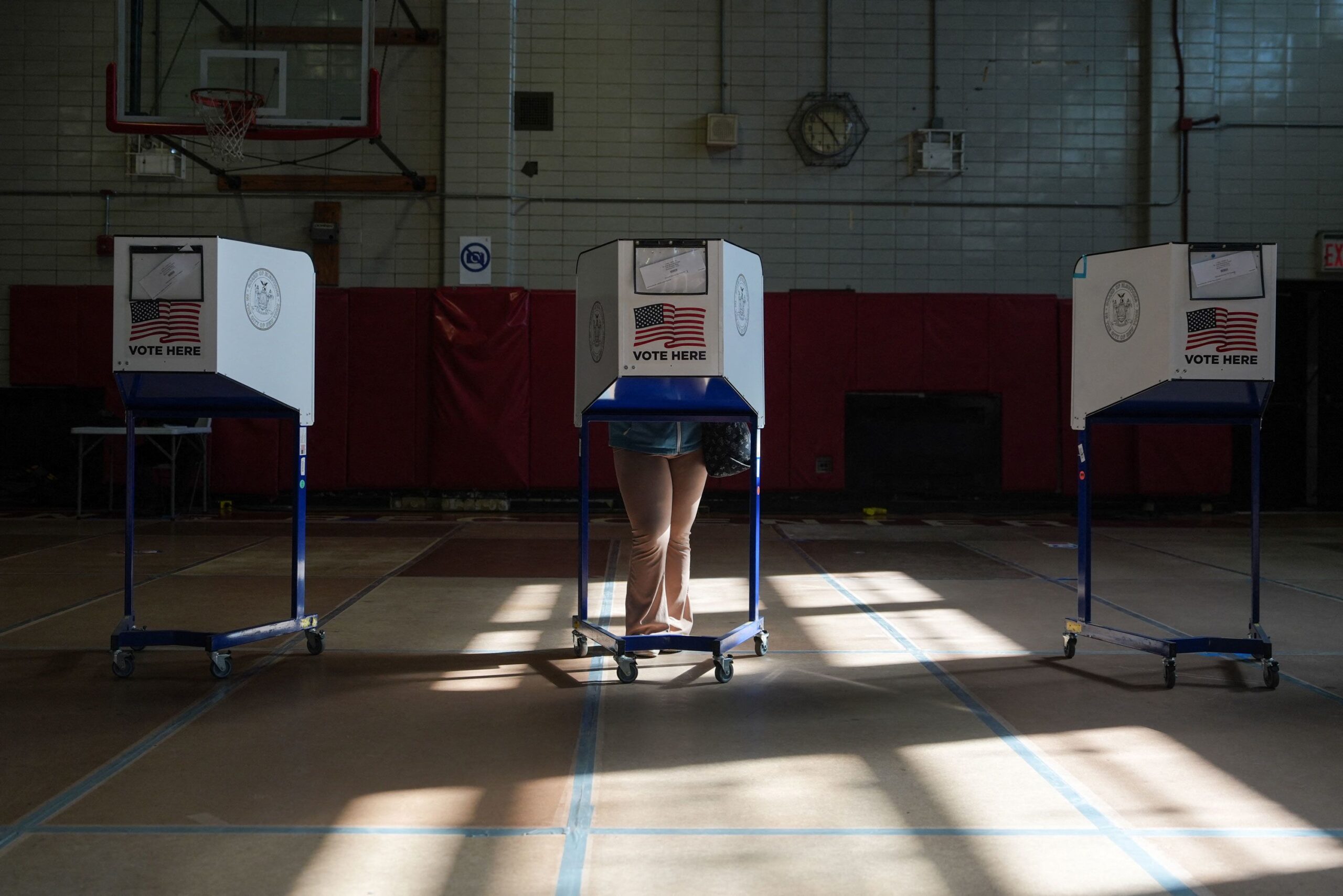 <i>Ryan Murphy/AFP/Getty Images via CNN Newsource</i><br/>A voter casts their ballot on the first day of early voting for the US midterm elections in the Brooklyn borough of New York City