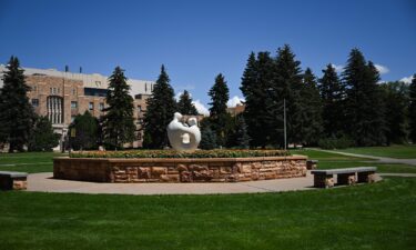 The University Family statue stands on the University of Wyoming campus in Laramie