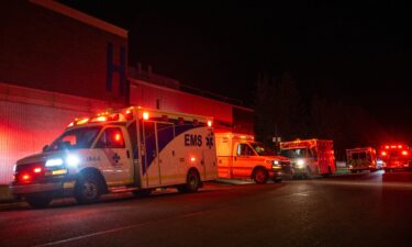 Emergency crews and military personnel pictured after a major fire breaks out at a Canadian military base.