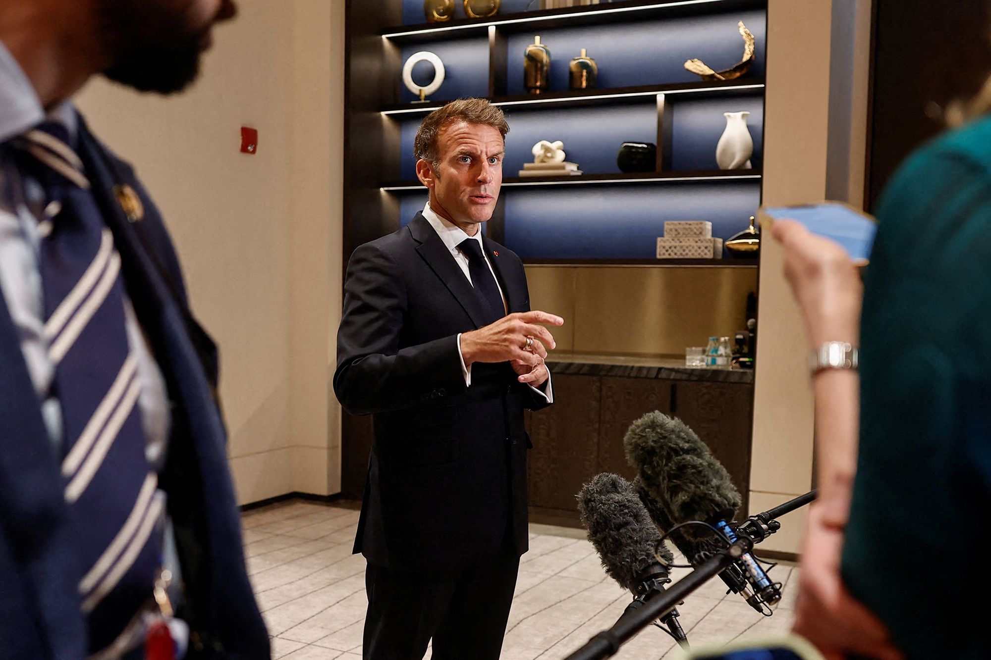 <i>Benoit Tessier/AFP/Getty Images via CNN Newsource</i><br/>French President Emmanuel Macron speaks to members of the media in Lusail