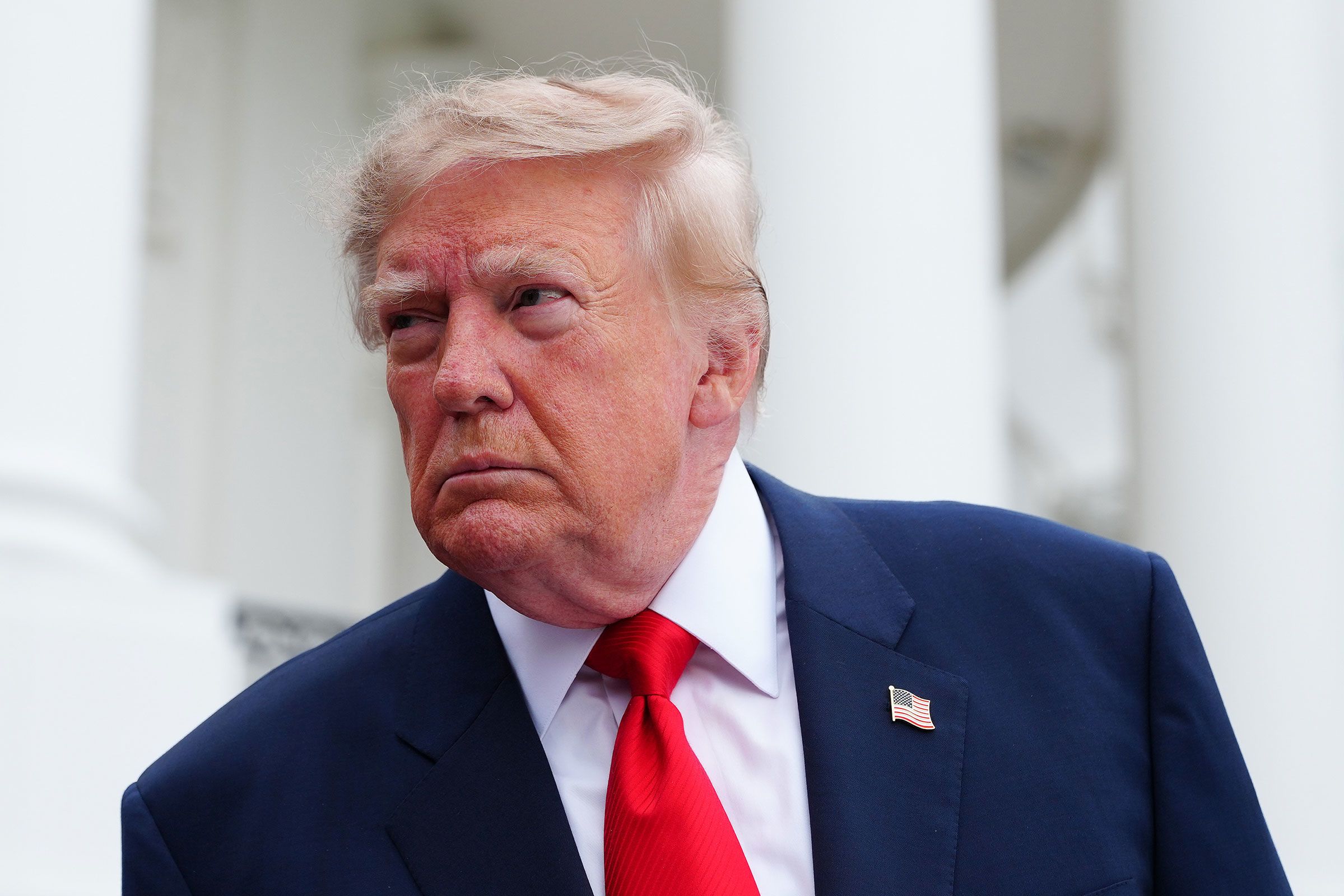 <i>Aaron Schwartz/Getty Images via CNN Newsource</i><br/>President Donald Trump speaks to members of the media as he departs the White House on October 10.