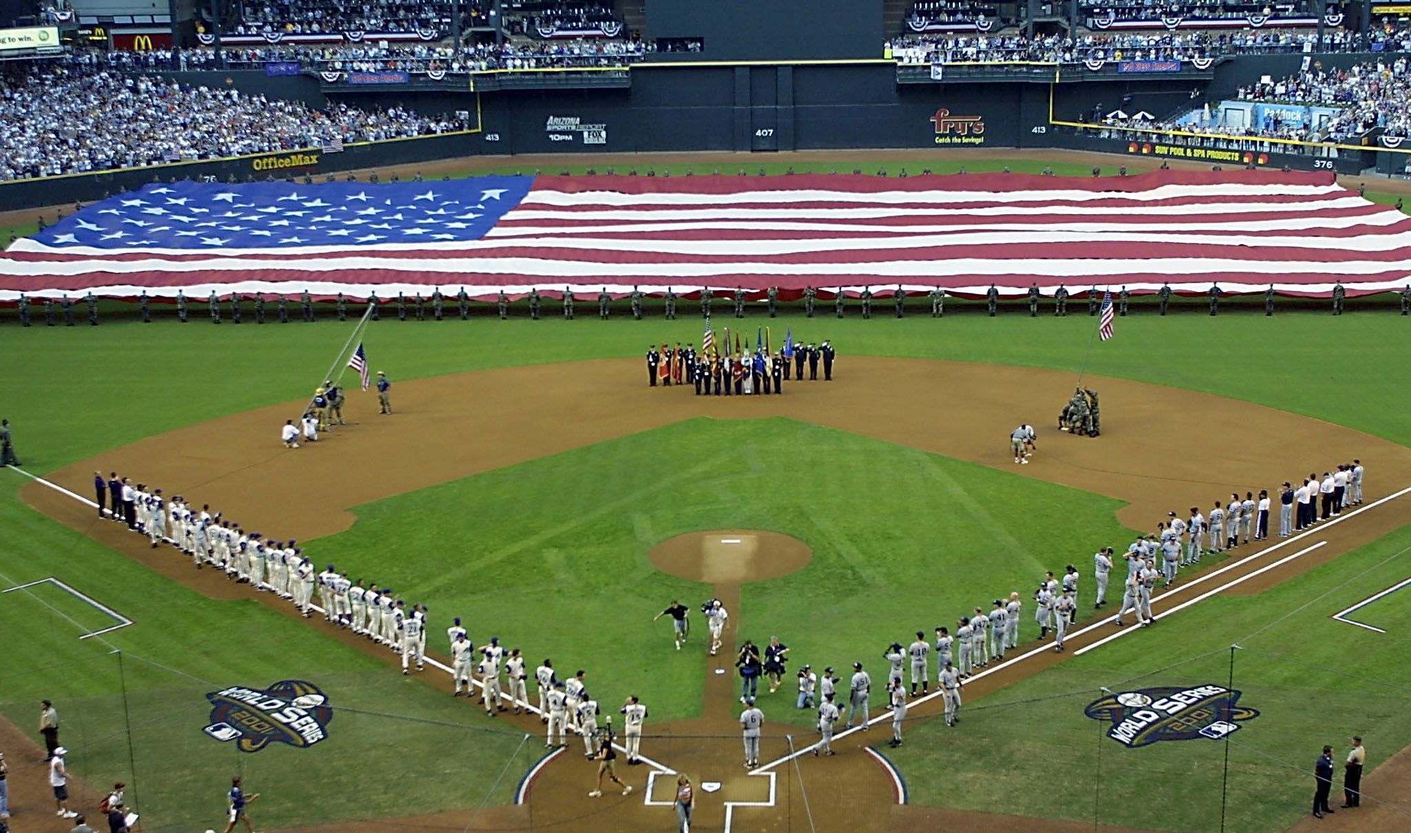 <i>Roberto Borea/AFP/Getty Images via CNN Newsource</i><br/>Bush hurls the ceremonial first pitch during Game 3 of the 2001 World Series.